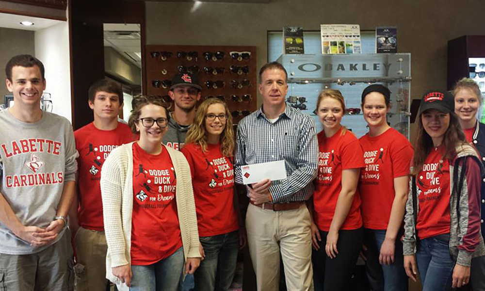 Public Relations presents check to Big Brothers Big Sisters