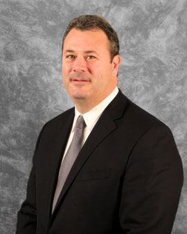 Gregory E. Forbes
